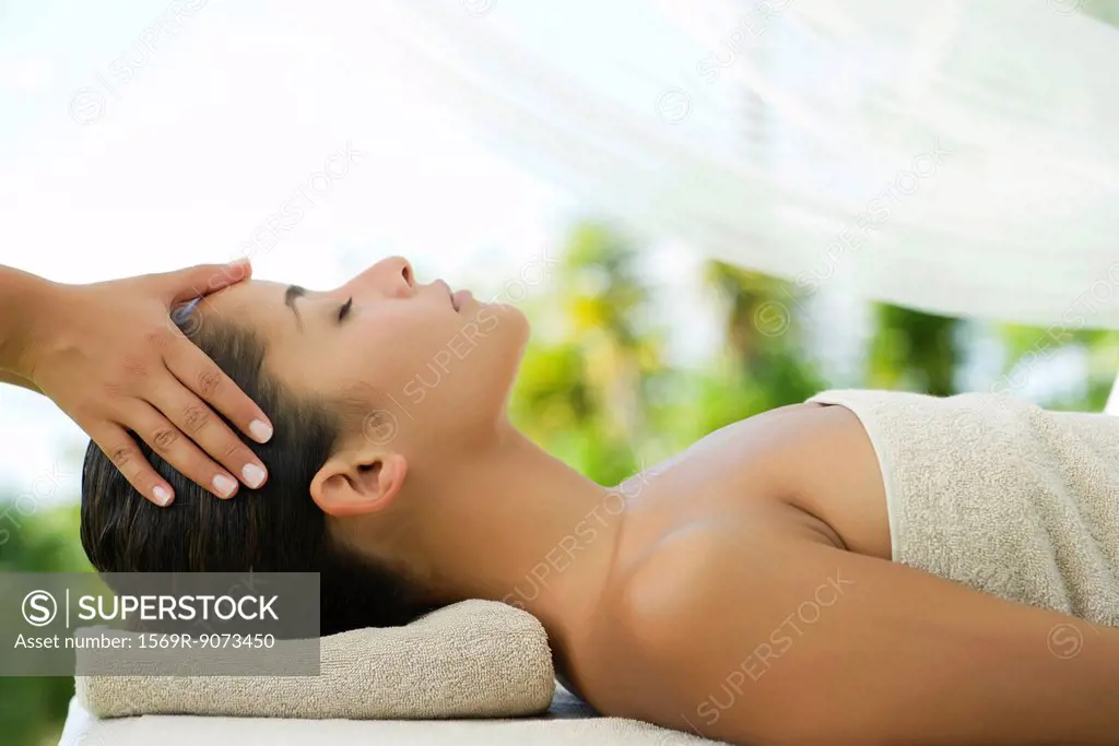 Woman getting a massage at spa
