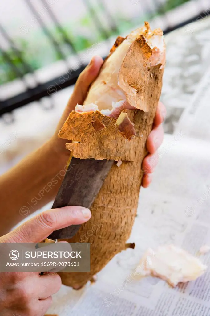 Peeling cassava