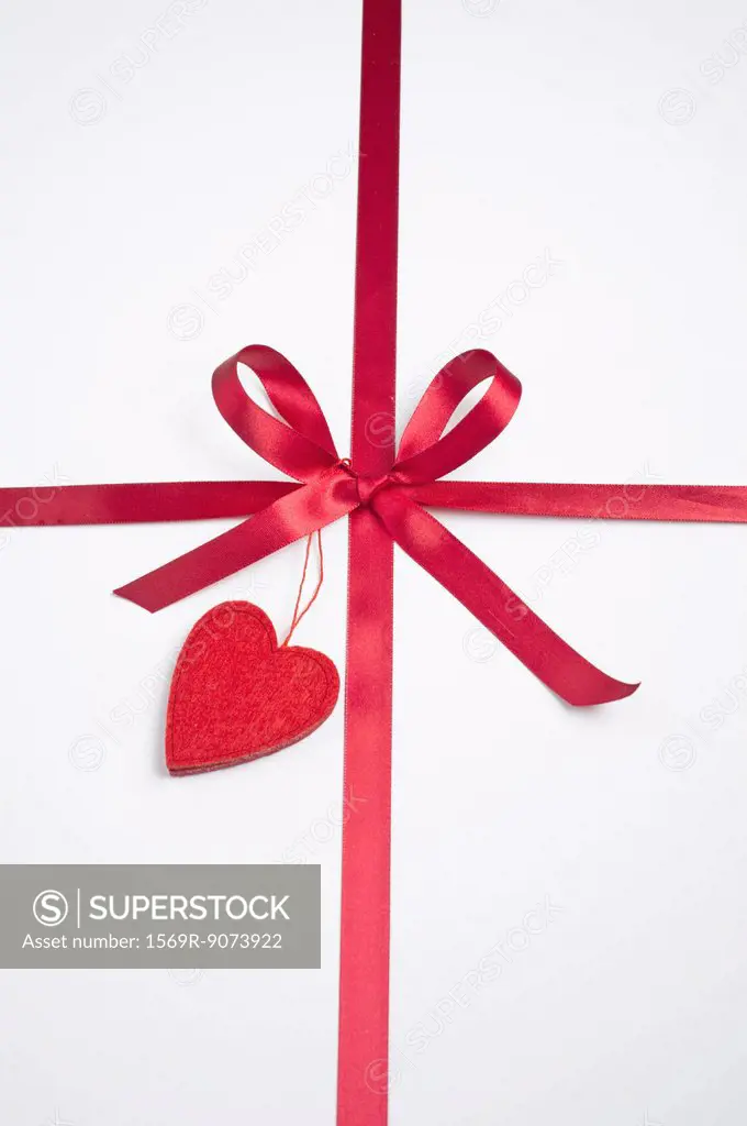 Gift decorated with ribbon and heart