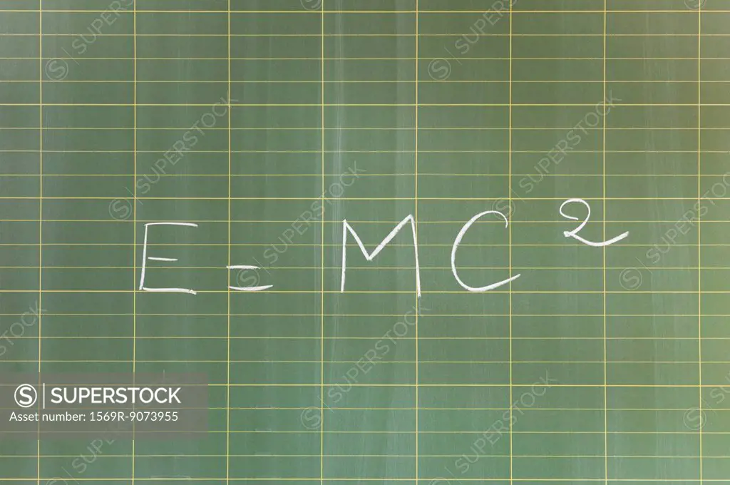 Massenergy equivalence formula E = mc2 written on blackboard
