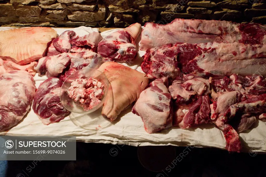 Pork cuts on counter in butcher´s shop