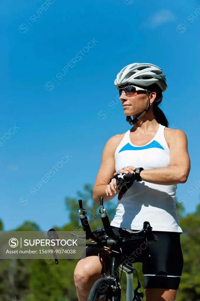 Female cyclist taking break