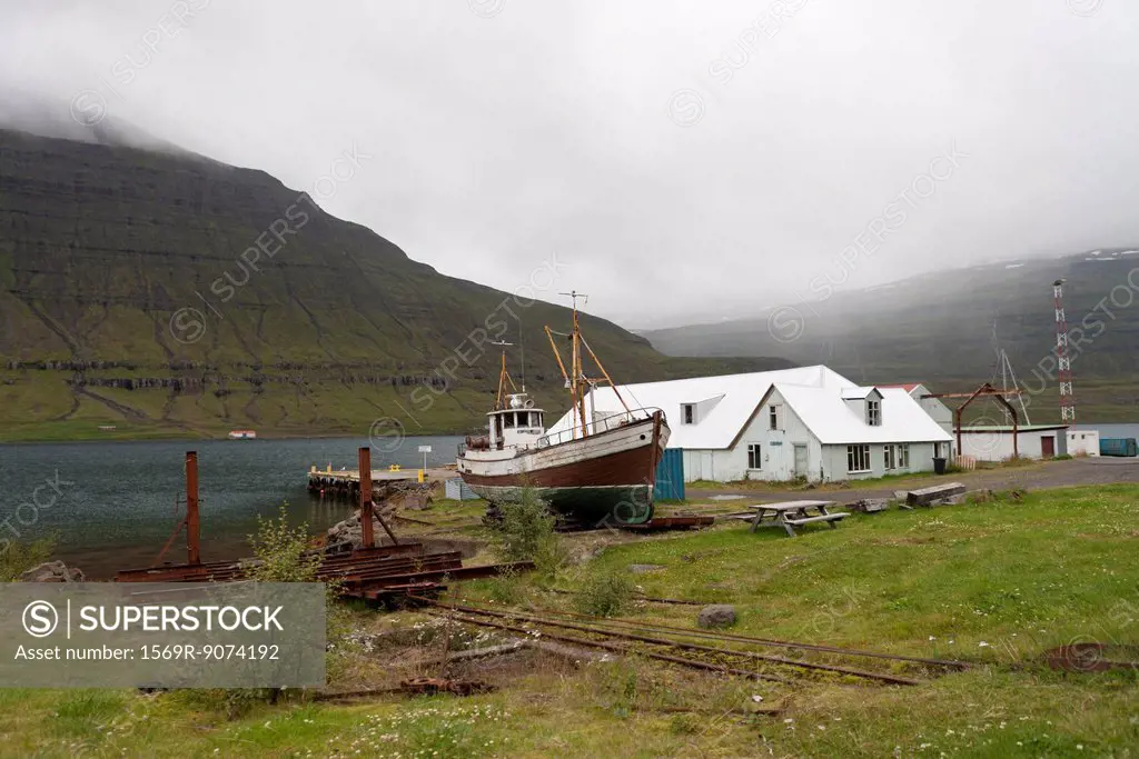 Boat drydocked in fishing village, Iceland