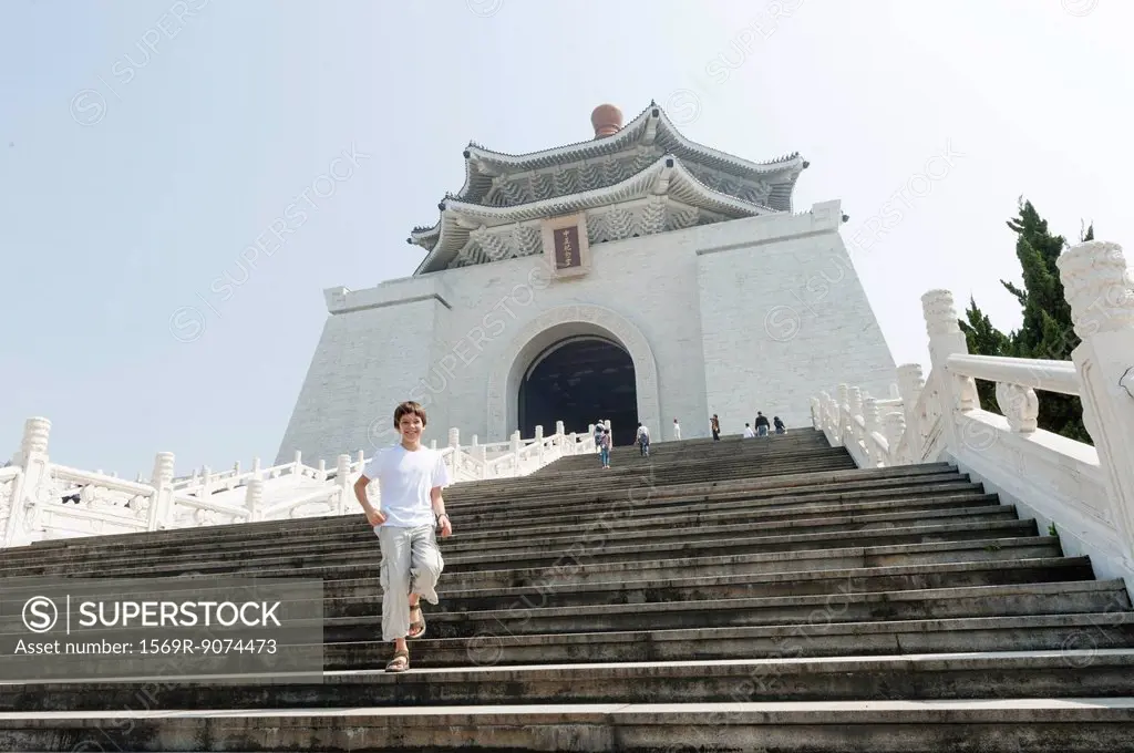Boy going down steps of Chiang Kai_shek Memorial Hall, Taipei, Taiwan