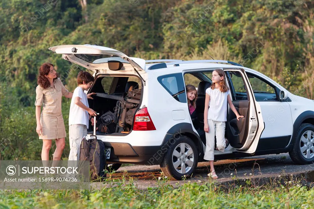 Family with SUV exploring the outdoors