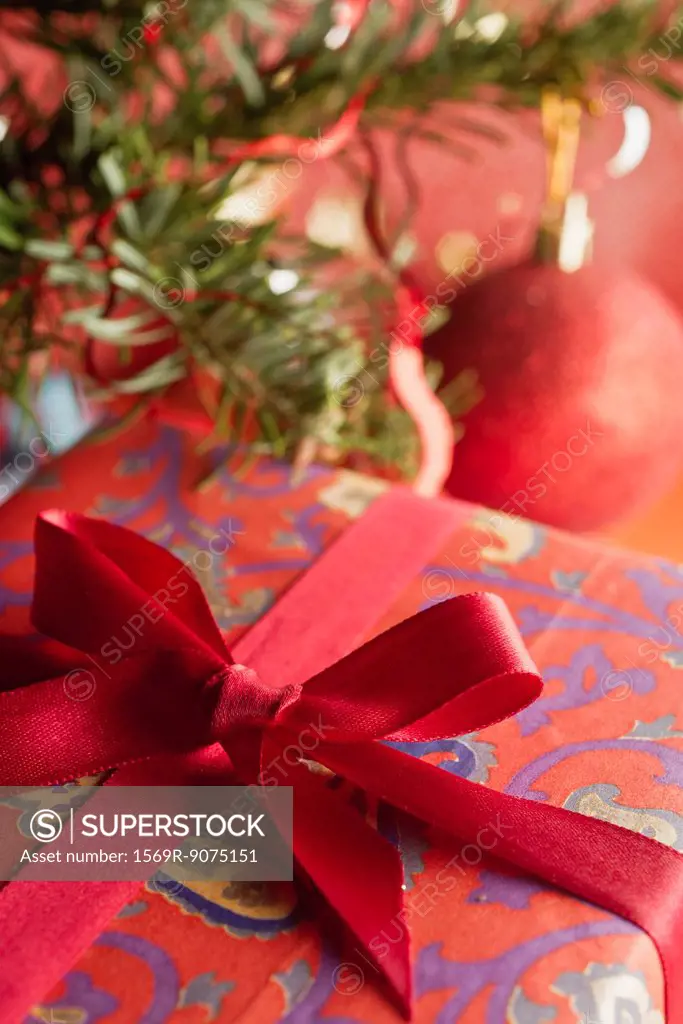 Festively wrapped Christmas gift, close_up