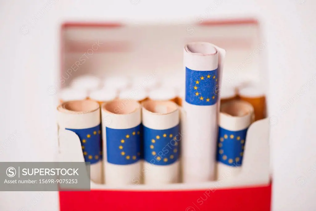 Cigarette pack containing rolled euros
