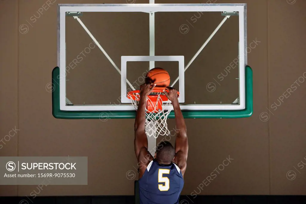 Basketball player making a basket