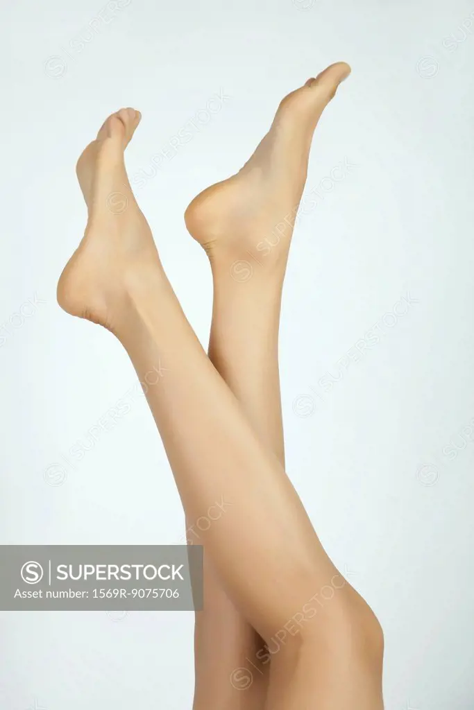 Woman´s bare legs and feet, cropped