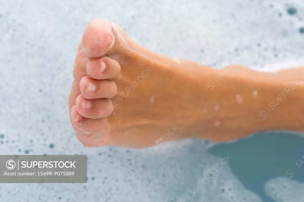 Woman´s foot in bath, directly above