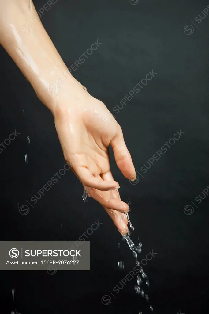 Hand under running water