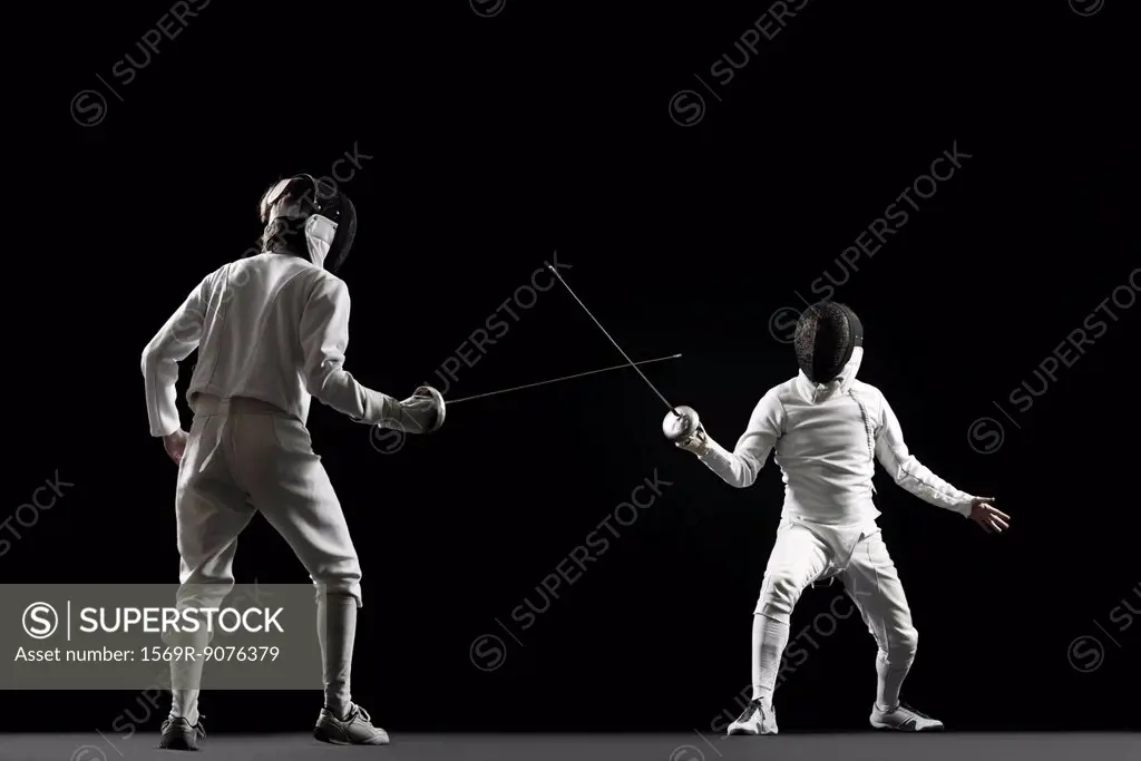 Fencers fencing