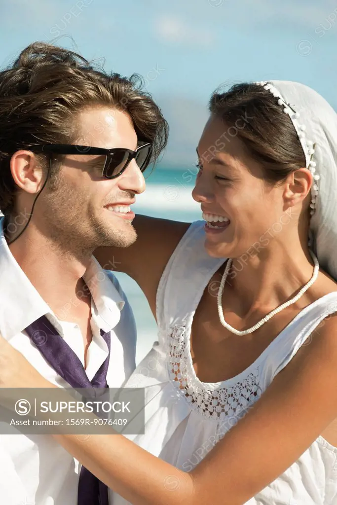 Bride and groom at the beach, portrait