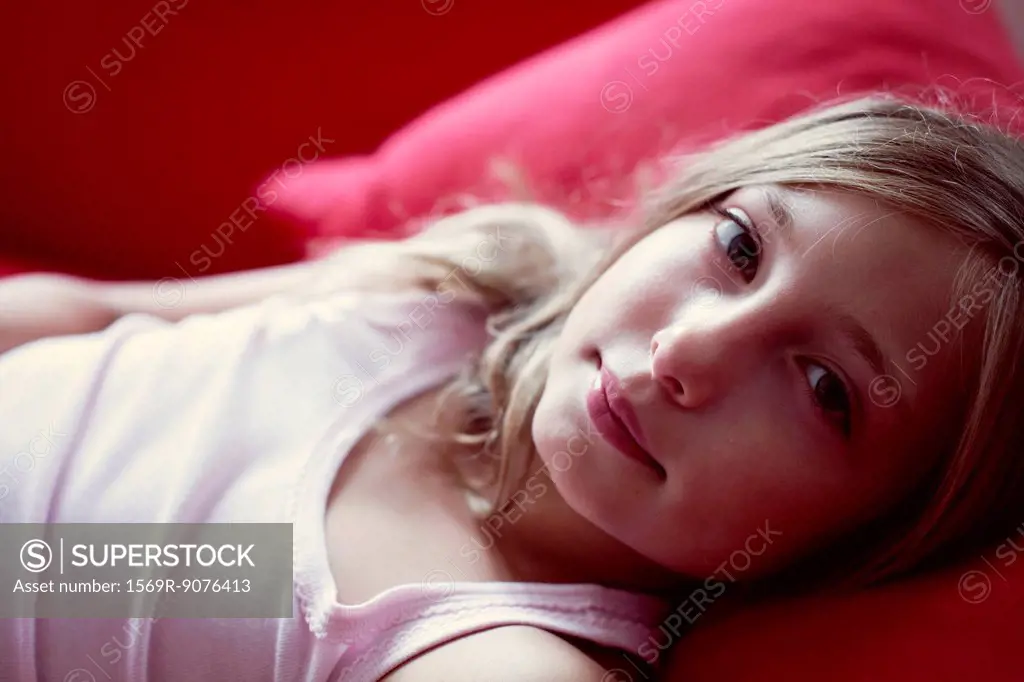 Girl lying on couch, portrait