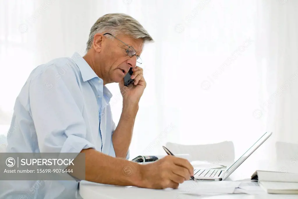 Senior man talking on cell phone