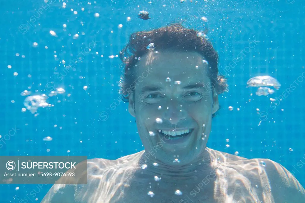 Man underwater, portrait