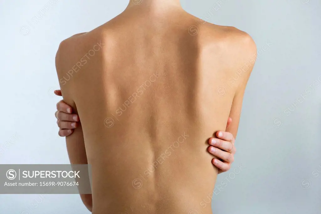 Woman´s naked back, mid section