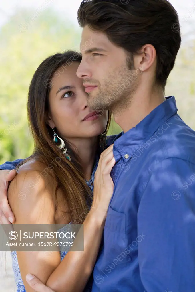 Young woman looking at boyfriend with admiration, portrait