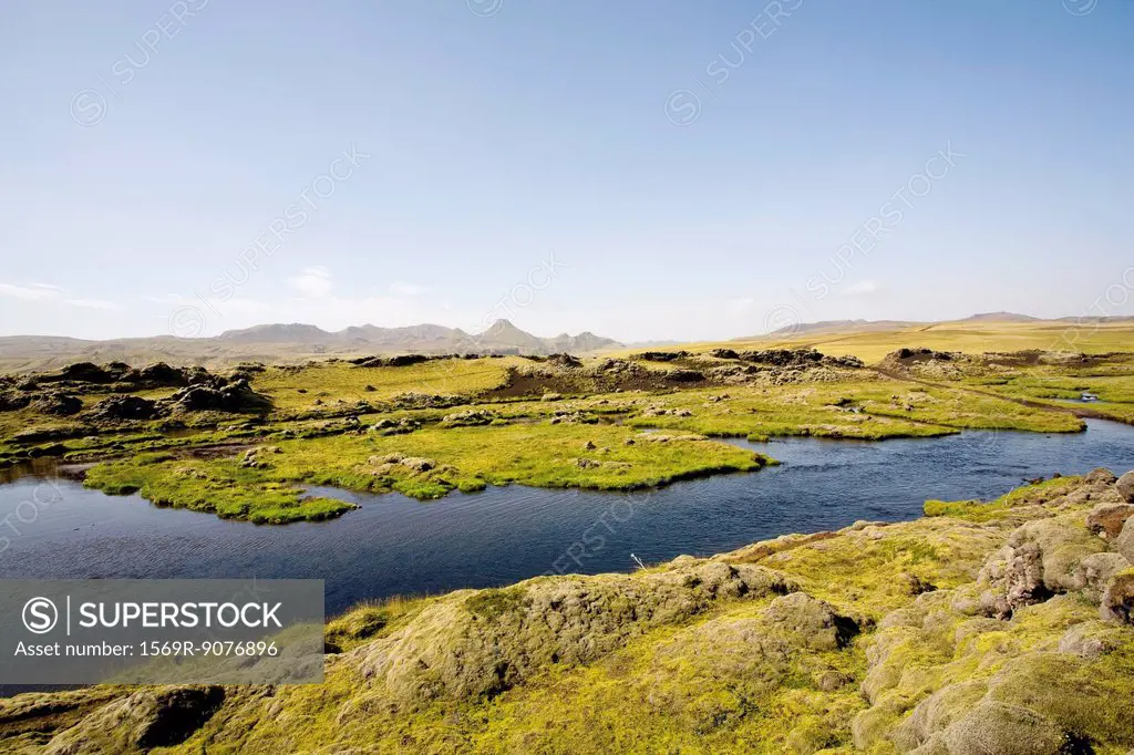 Moss covered lava field and crater lake, Lakagigar, Iceland