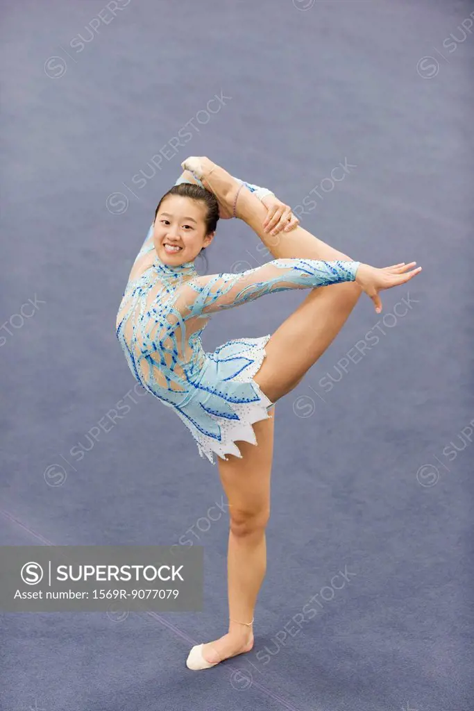 Female gymnast performing floor routine