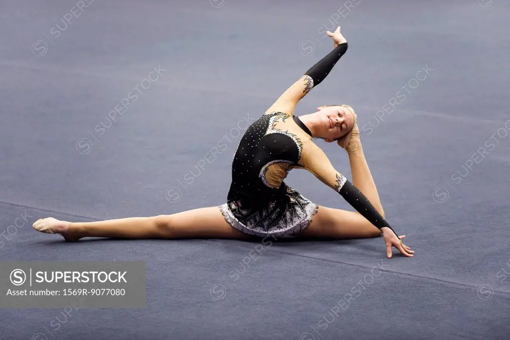 Female gymnast performing floor routine