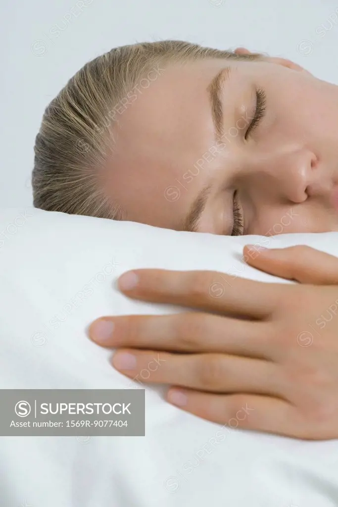 Young woman sleeping, cropped