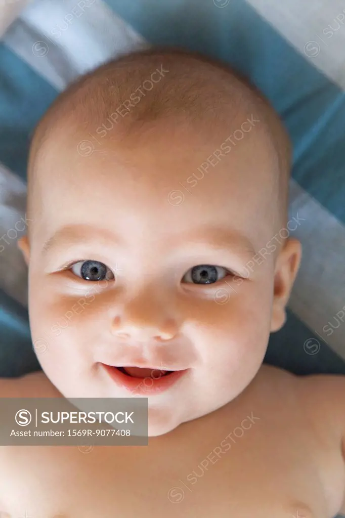 Baby smiling at camera, portrait