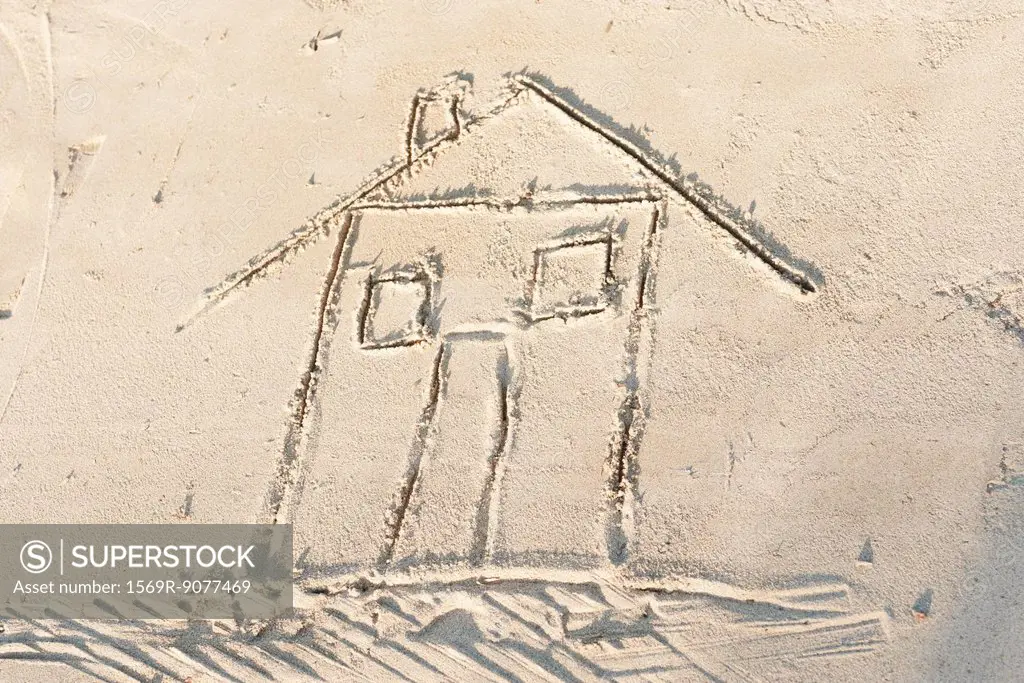 House drawn in sand, high angle view