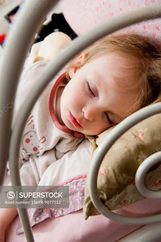 Little girl napping, close_up