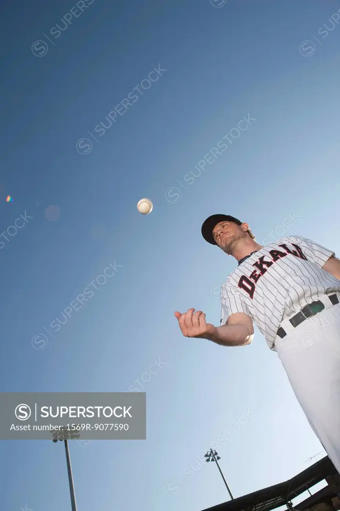 Baseball player catching ball