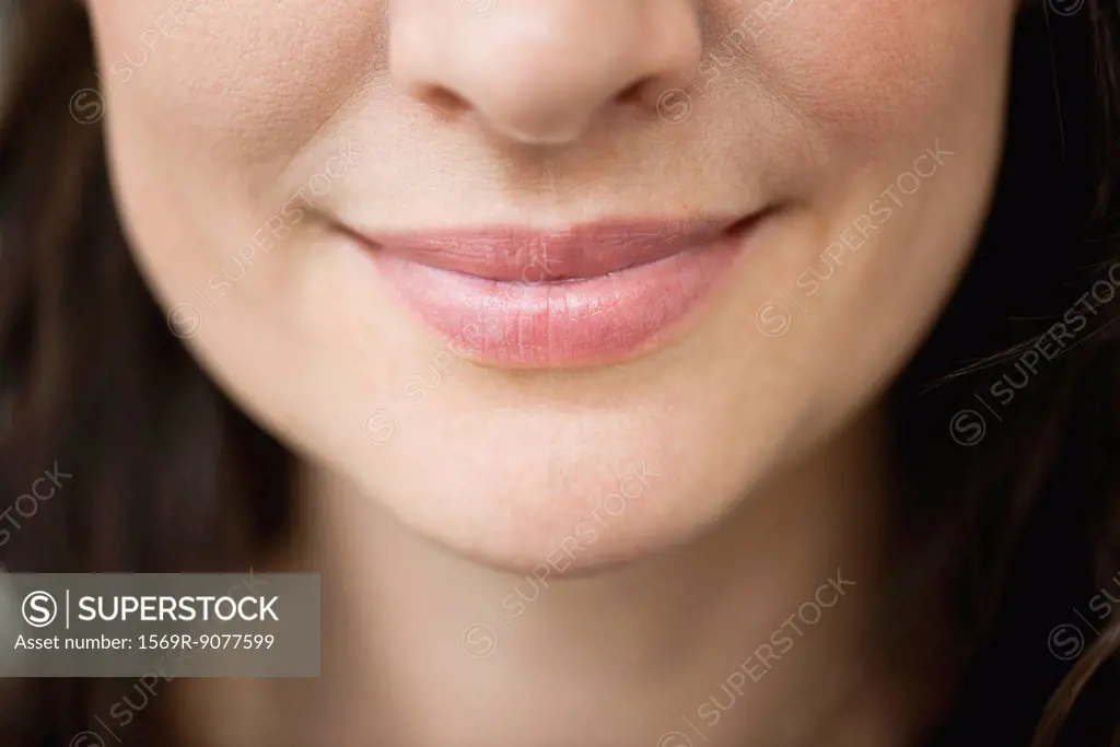 Close_up of woman´s smiling lips