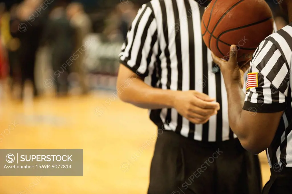 Basketball referees, cropped