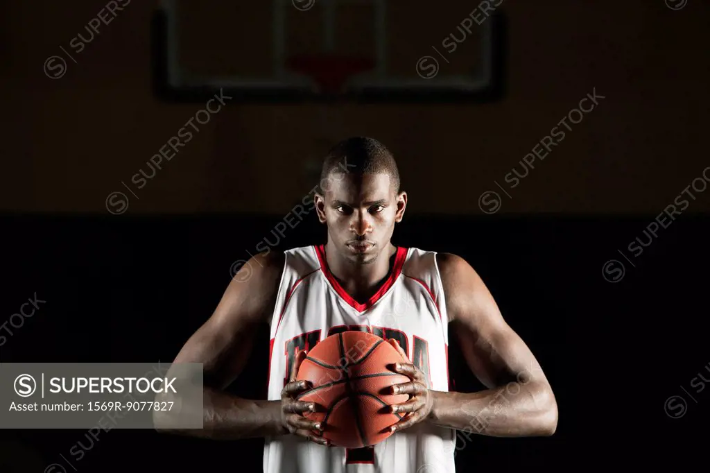 Basketball player preparing to shoot basket