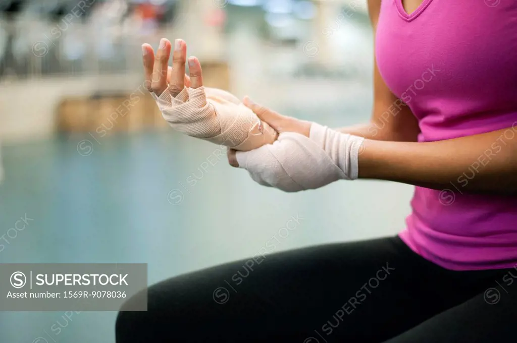 Woman with bandaged hands, cropped