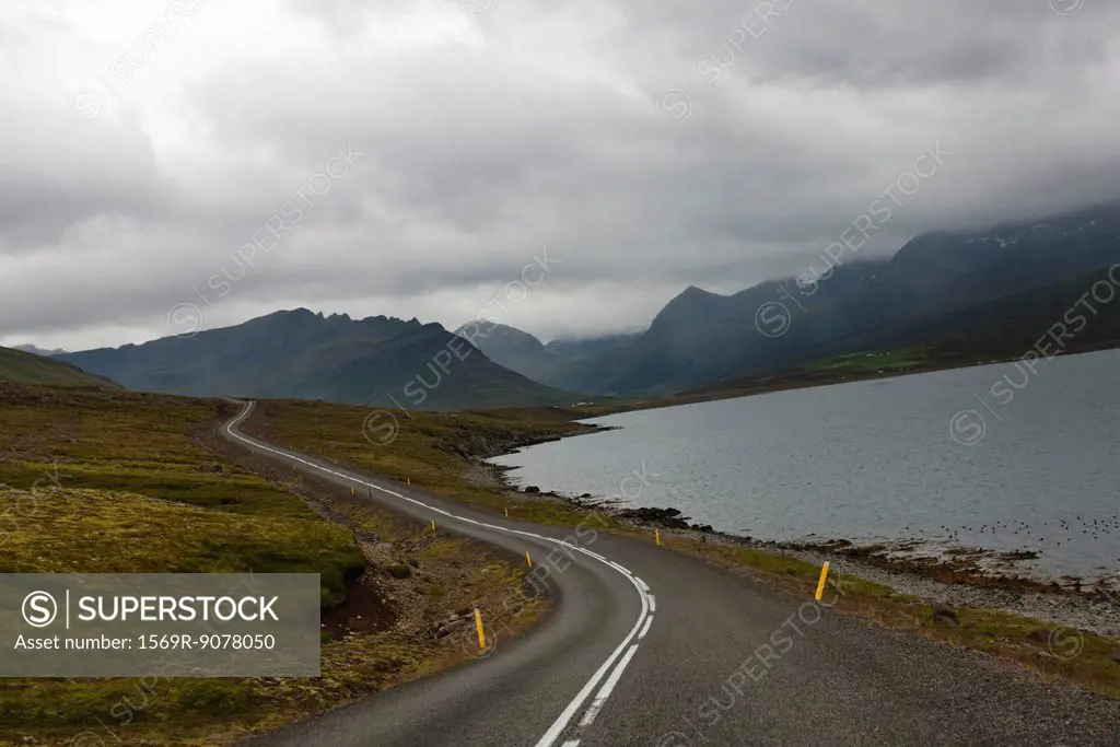 Road winding along coast, Iceland