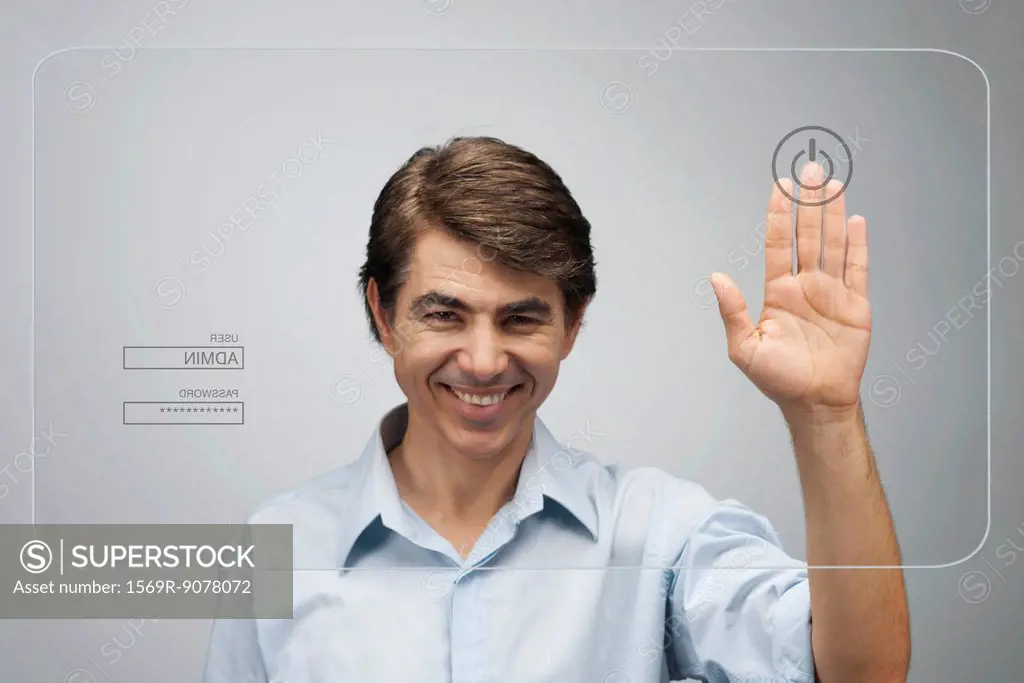 Man touching power button on advanced touch screen interface