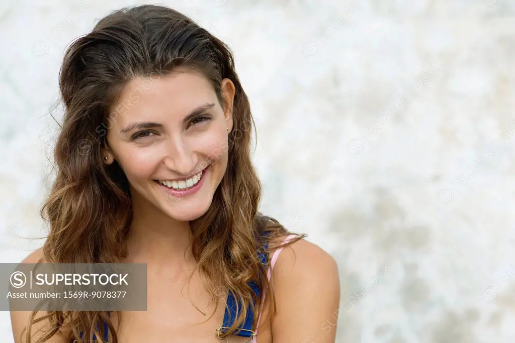 Young woman smiling, portrait