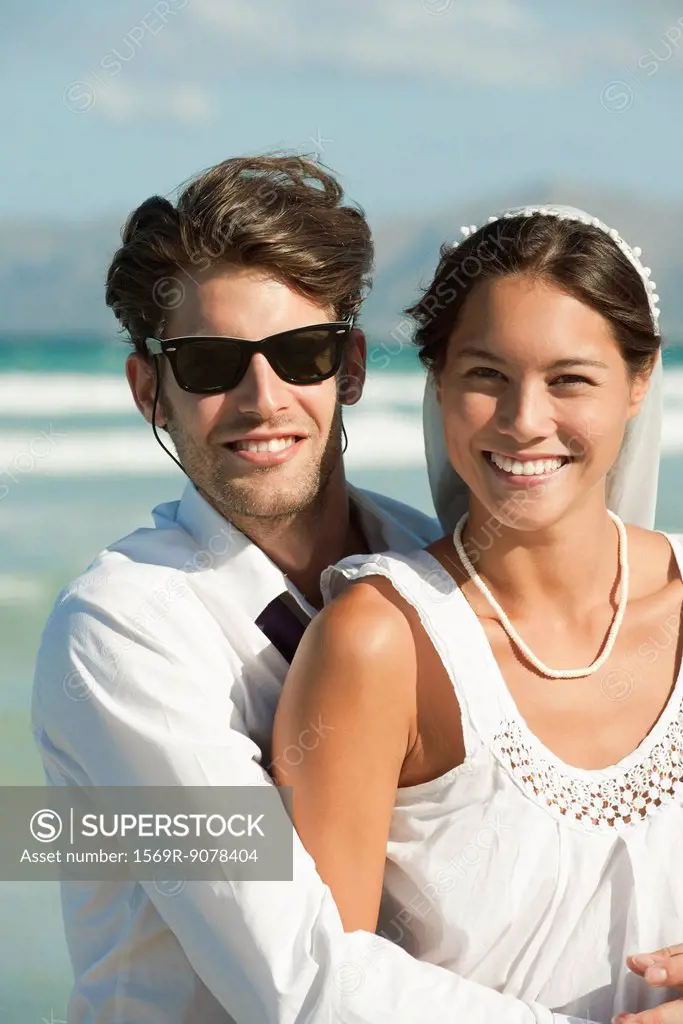 Bride and groom at the beach, portrait