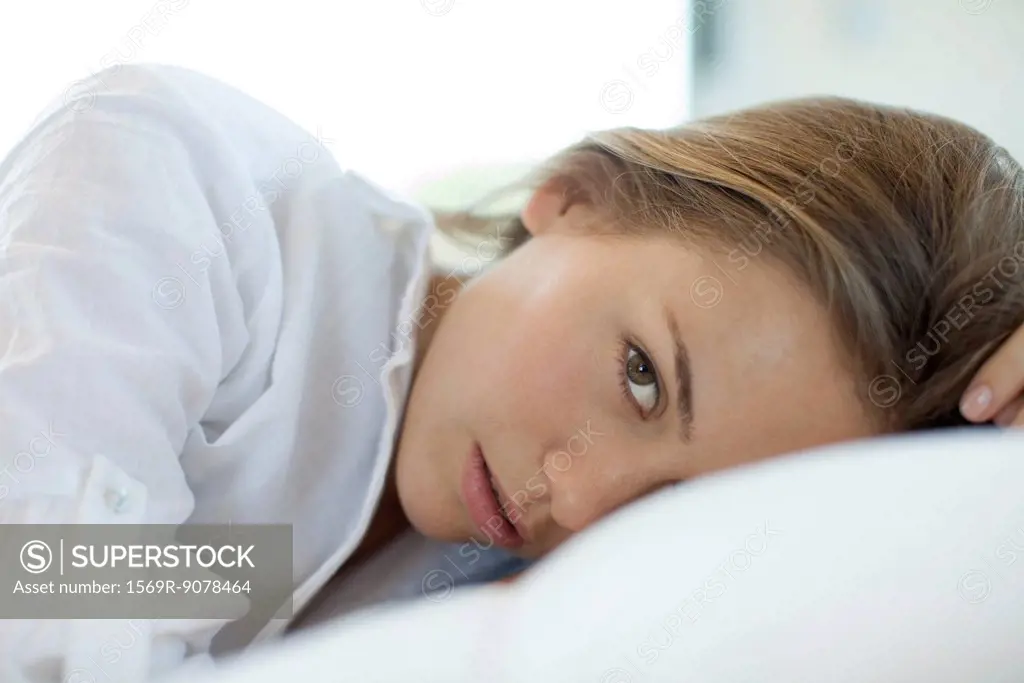 Woman lying down, portrait