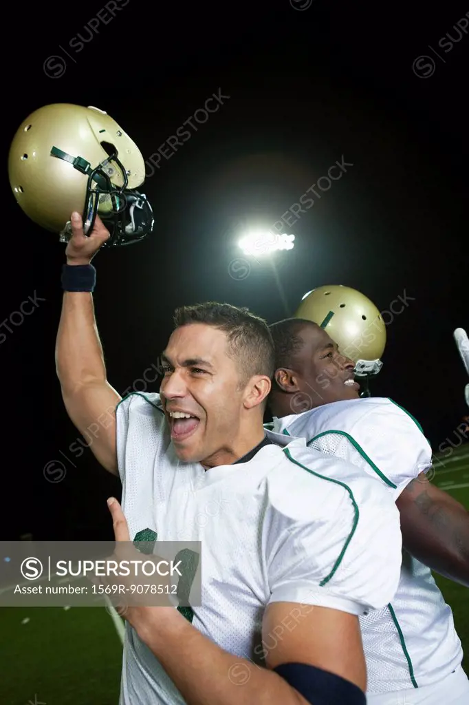 Football players celebrating victory