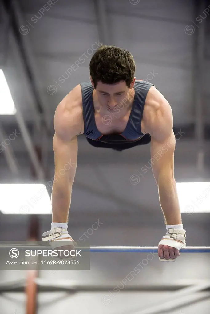 Male gymnast on horizontal bar