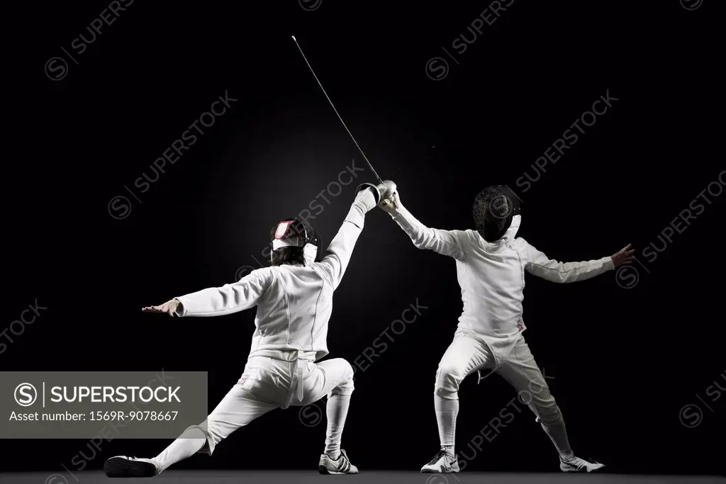 Fencers fencing