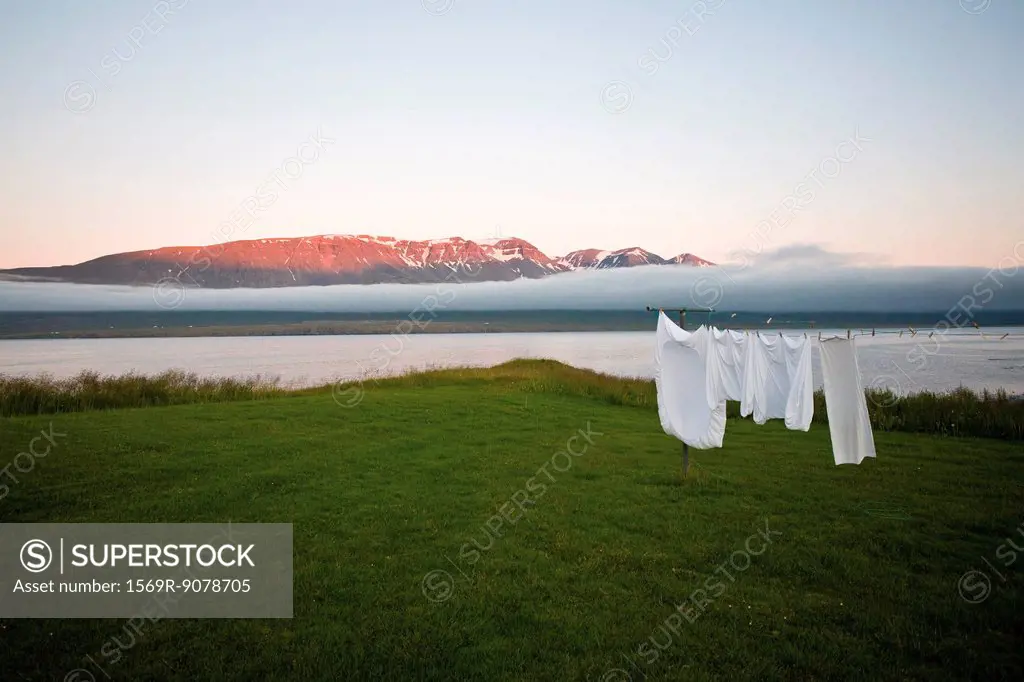 Laundry drying on clothes_line in remote landscape, Vopnafjordur, Iceland