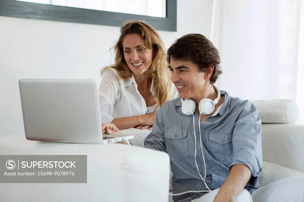 Couple looking at laptop computer
