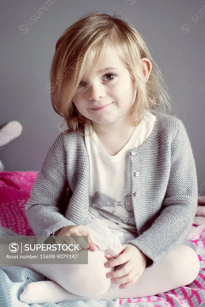 Little girl sitting, portrait