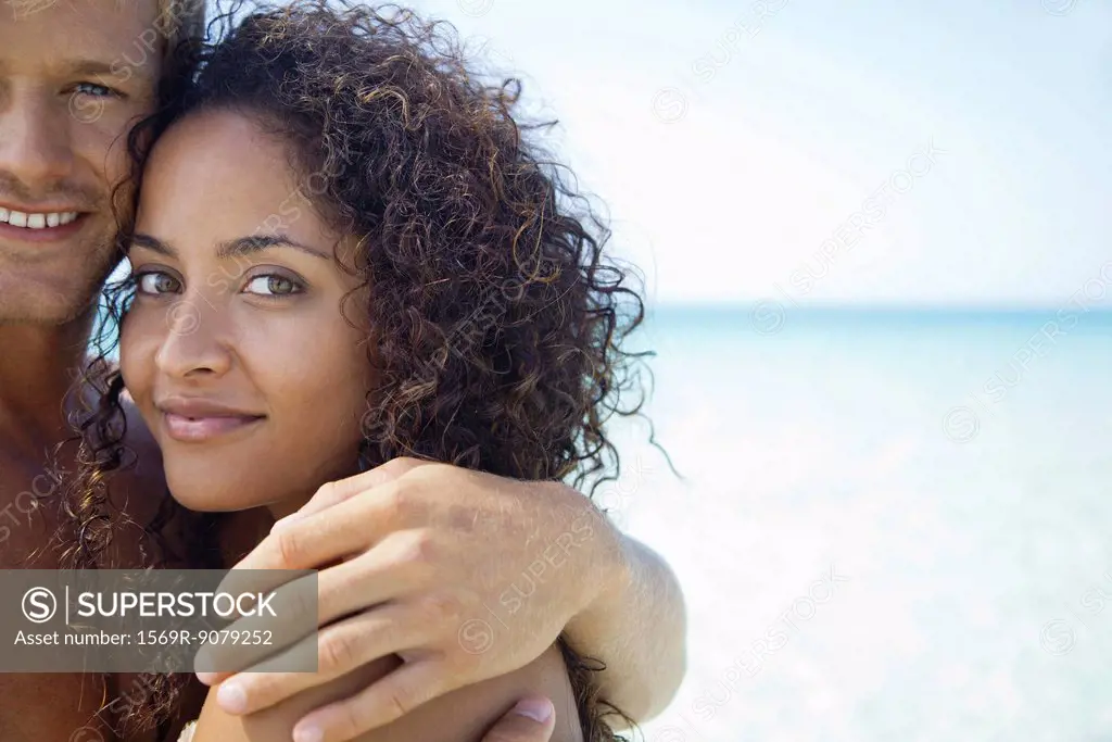 Couple at the beach, cropped portrait