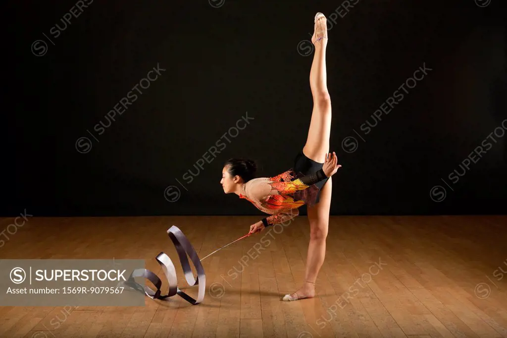 Gymnast performing standing splits