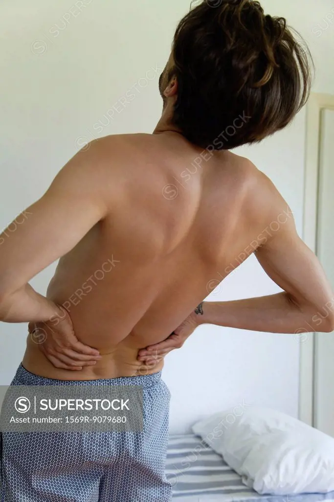 Man experiencing lower back pain