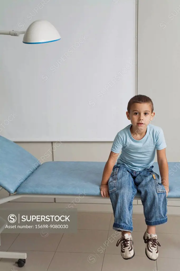 Boy waiting in doctor´s office