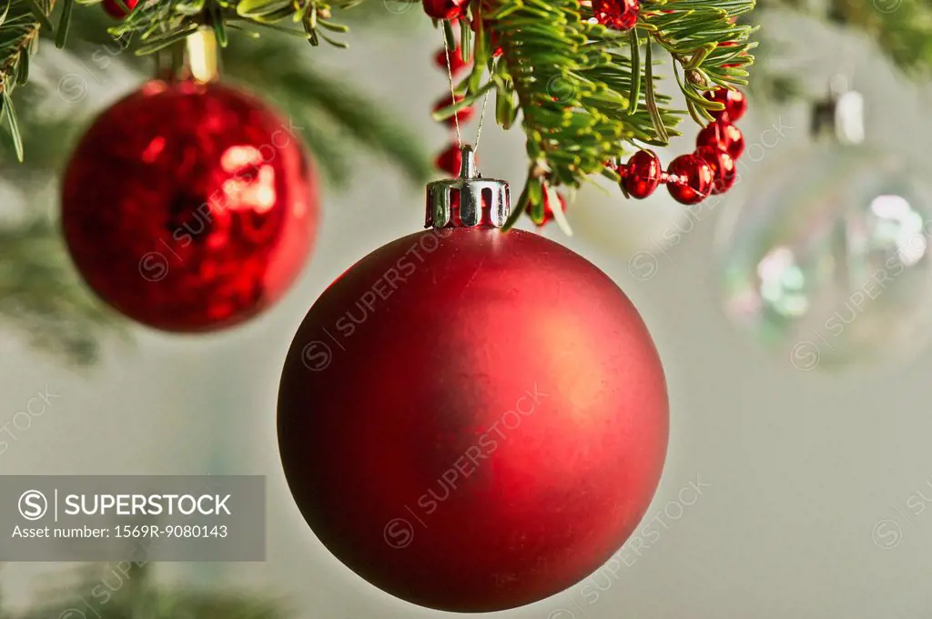 Christmas baubles hanging from Christmas tree